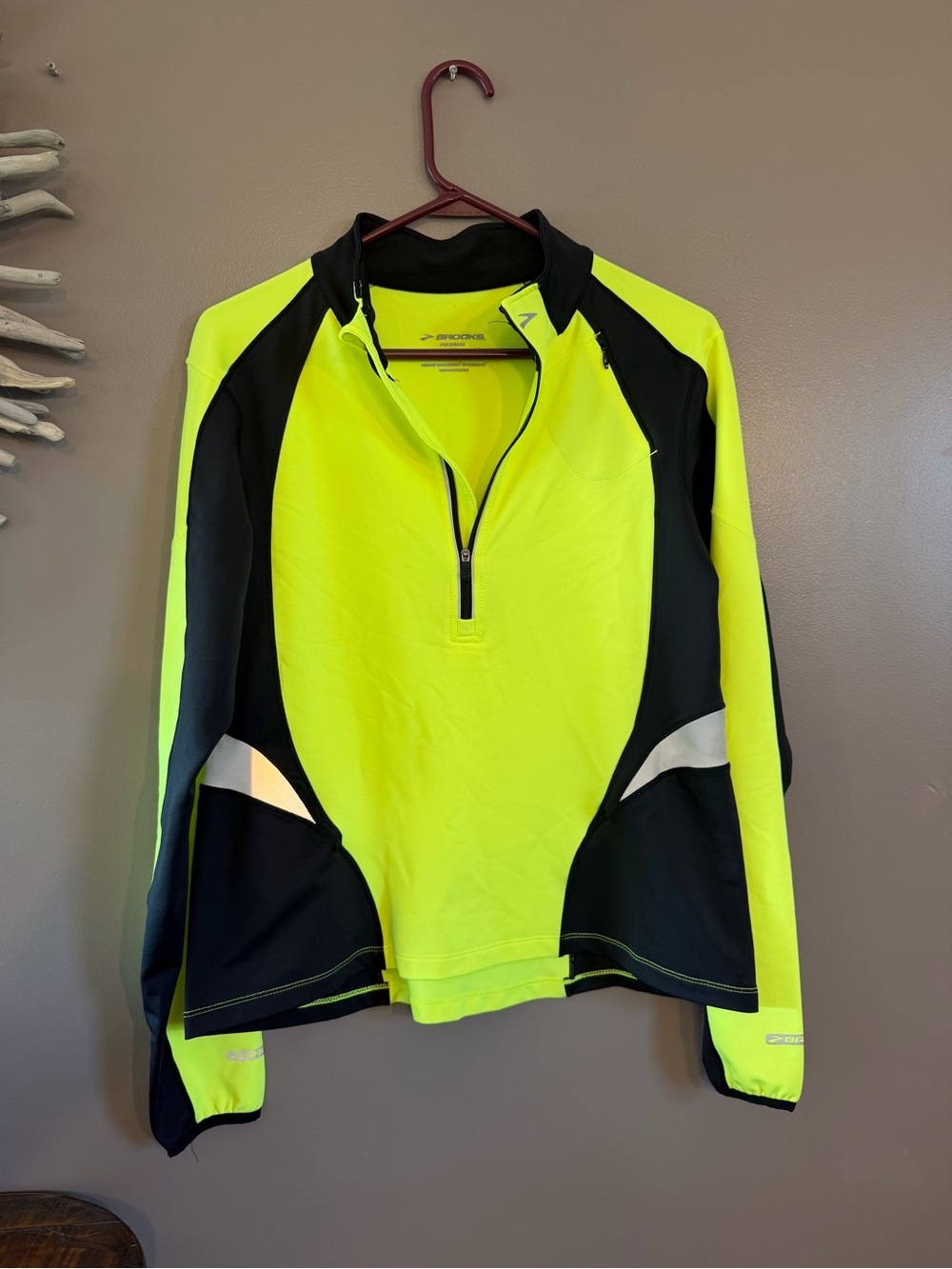 Brooks Men's long sleeve cycling pullover jersey top featuring a vibrant yellow